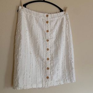 Anthropologie XL cream linen knee length skirt raw edge detail, button front